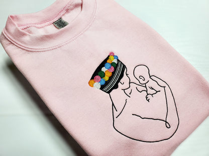 A MOTHER'S LOVE SWEATER